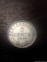 Obverse side of 1941 Newfoundland 5 cents coin showing denomination, year, and decorative details.
