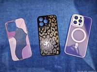 Group shot of the three iPhone 15 Pro Max cases