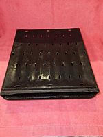 Top view of assembled perforated rack over tray