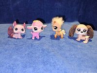 Group shot of all four Littlest Pet Shop flocked animal figures