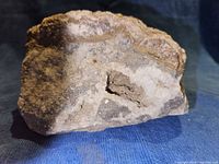 Front view showing quartz-lined cavity in host rock