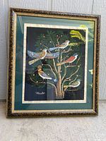 Framed artwork showing the entire piece with tree and birds on papyrus.