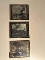 Photo showing all three antique magic lantern photo plates with maritime and city scenes in black and white