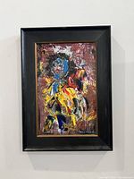 Front view of framed painting shows full artwork and frame