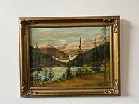 Frontal view of entire painting and frame mounted on wall