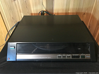 Front view with lid closed showing Sony logo, power button and control panel