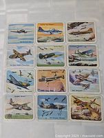 All 12 Cracker Jack Battle Planes cards laid out in four-by-three grid