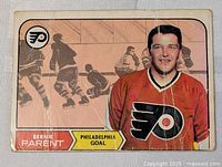 Front of Bernie Parent O-Pee-Chee card showing image, name, team and visible creases