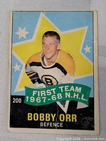 Front of Bobby Orr card displaying design, player image, card number 200, creases