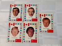 Group shot of five Team Canada cards