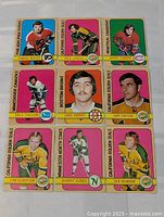 All nine cards laid out in 3x3 grid