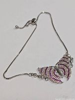 Photo showing front view of sterling silver adjustable bracelet with butterfly cubic zirconia centerpiece.