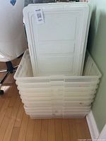 Stack of clear bins showing size and quantity