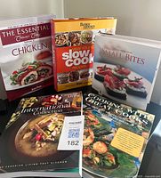 All five cookbooks front covers visible