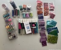 Overview of all glitter containers, pens and bags
