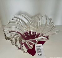 Top angled view of clear crystal swirl bowl showing overall form and rim