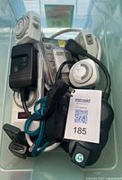 Assorted timers and modules inside tote