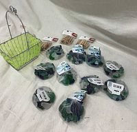 Top view showing all items including sea glass bags, wire basket, and clothespins