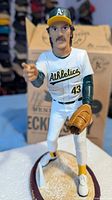 Full view of Dennis Eckersley figurine on base