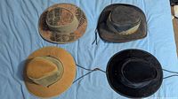 Four of the five ventilated cowboy hats laid out