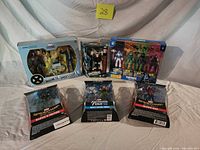 Group shot of all six sealed action figure packs
