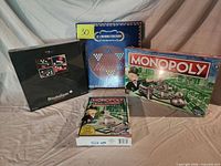 All four sealed games visible together