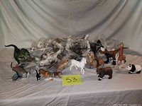 Group shot of all figurines, both loose and bagged