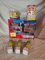 Group shot of all seven packaged toys