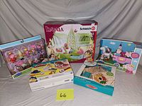 Group shot showing all five boxed toys