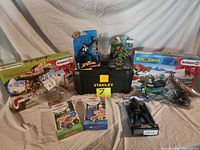 Full lot overview showing all boxed and loose items