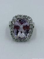 Top view showing amethyst-type stone and halo