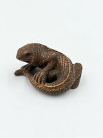 Top view of carved Komodo dragon netsuke