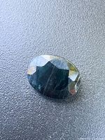 Front view of oval sapphire showing facets