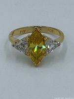 Full view of ring showing citrine center and side stones