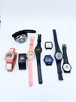 Group shot of all nine watches