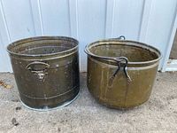 Both brass planters side by side showing size and condition