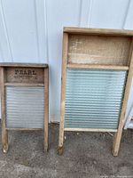 Both washboards side by side showing size difference and glass panels
