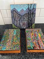 Front view of all three paintings