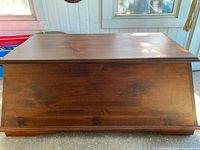Front view of wooden storage chest
