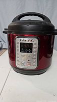 Front view of Instant Pot Viva multi-cooker showing digital display and control buttons.