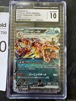 Front view of CGC graded Charizard ex Pokémon card showing holographic art and gem mint 10 certification.
