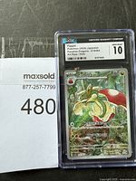 Front view of the Japanese CGC graded Flapple Pokémon card in protective casing showing grading details and card artwork.