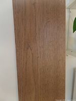 Close-up image of hickory engineered hardwood plank showing grain and color.