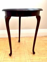 Full view of three-leg round side table