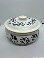 Casserole dish with lid showing blue sponge decoration