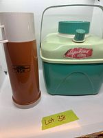 Both Thermos items side by side for size and color reference