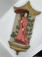 Full view of chalkware wall hanging