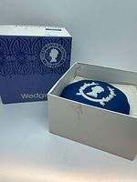 Candy box in original packaging showing outer box and inner dish