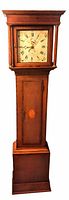 Full view of oak grandfather clock showing case and base