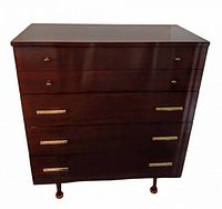 Front view of chest showing all drawers and legs